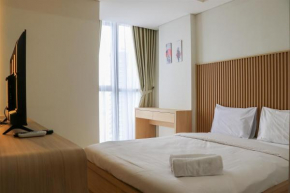 Elegant and Warm 1BR at Gold Coast Apartment By Travelio
